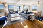 Living room & dining room overlooking the dunes and Cape Cod Bay